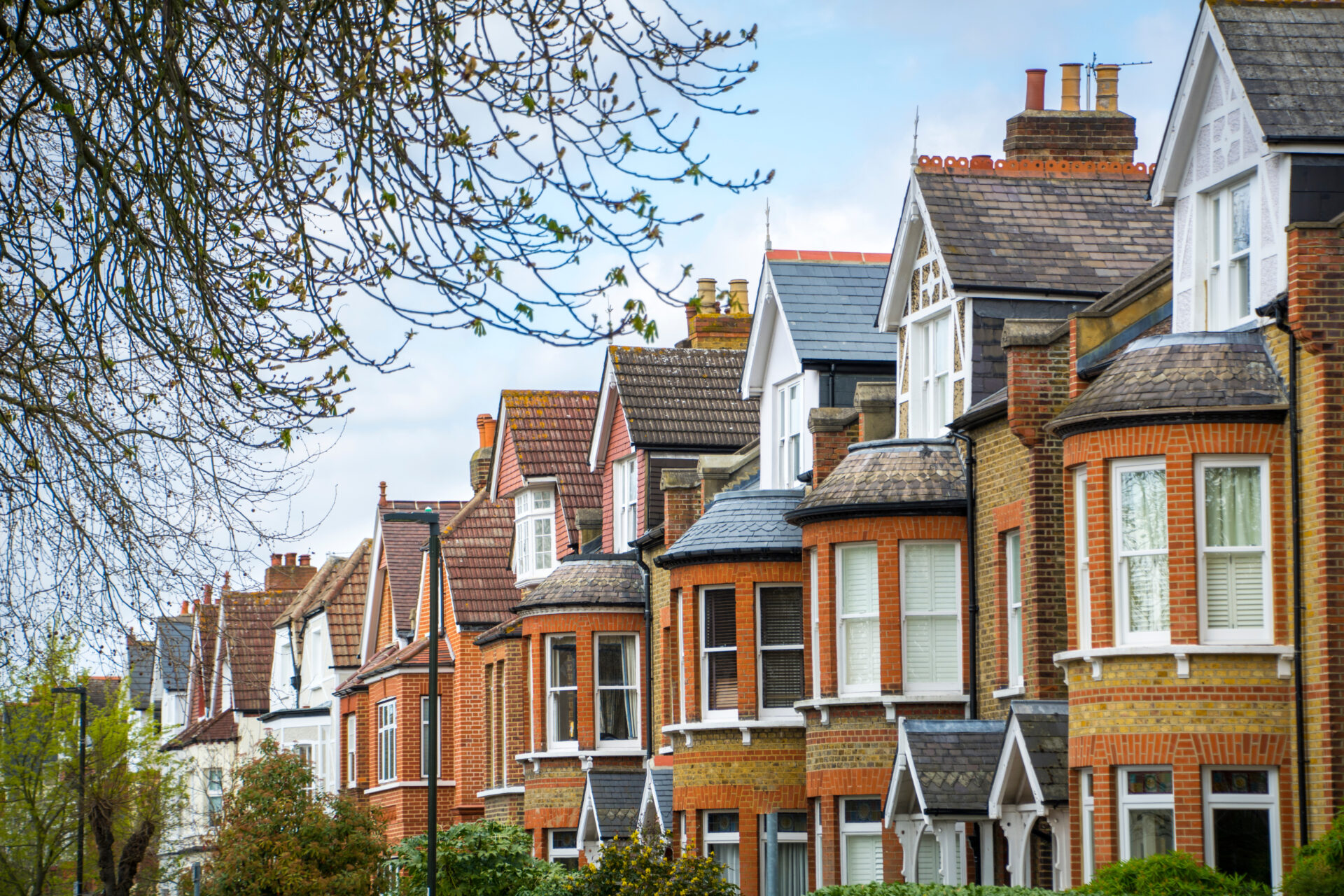 Street view of traditional brick terraced houses in Wednesbury popular for buy-to-let investment