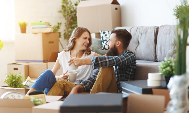 Couple relaxing in their new home in Finham CV3, reflecting the area's appeal for buyers, renters and families seeking quality living in Coventry.