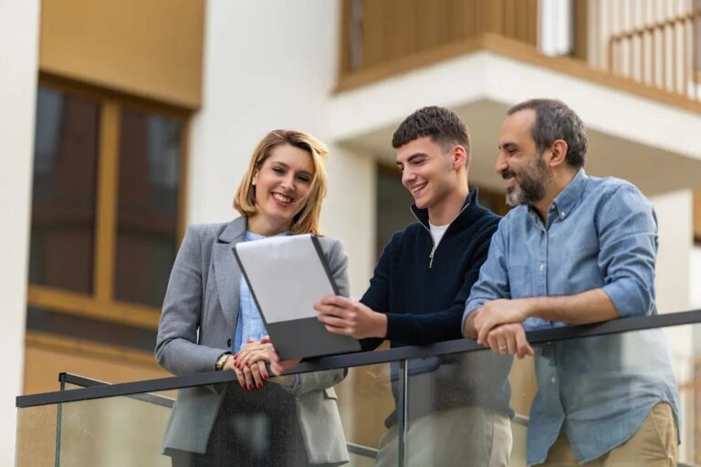 Estate agent with buyers viewing a home in Tilehurst